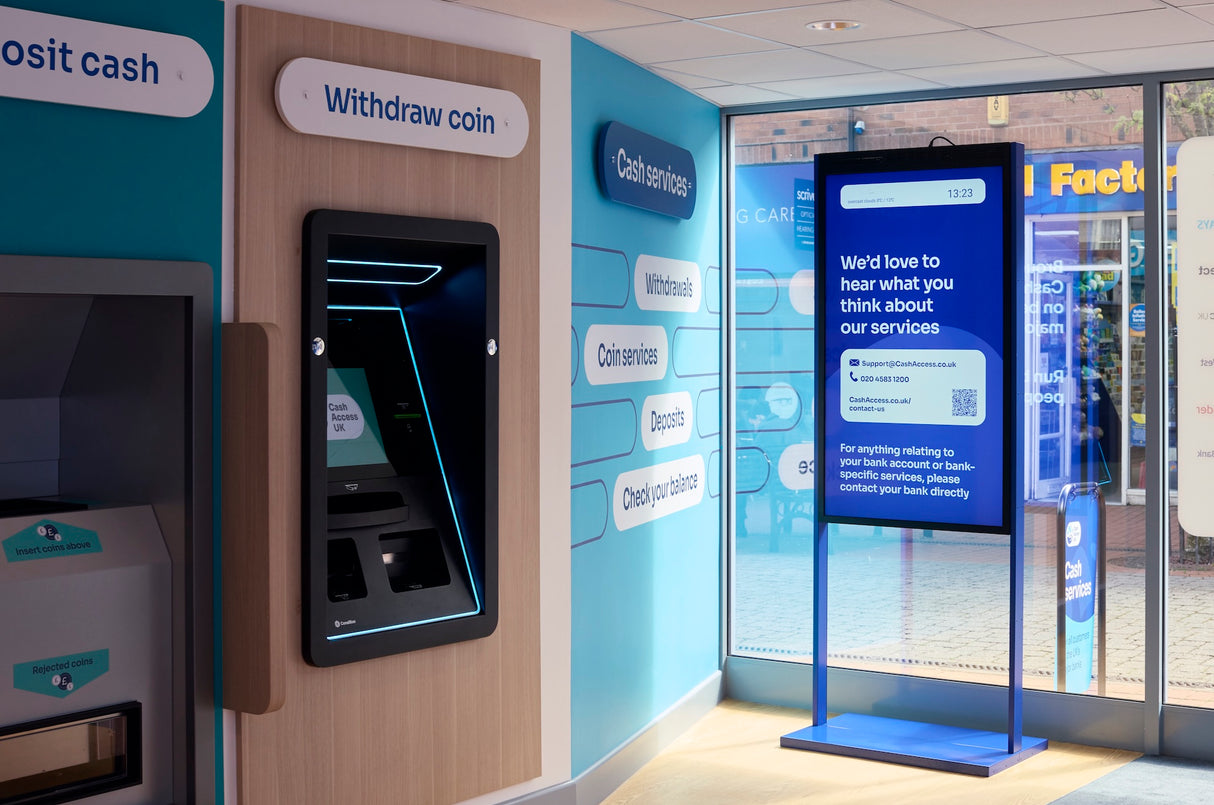 ATM machine with digital display inside a bank branch