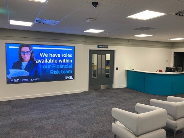 DVLED wall mounted in a recess in a business reception