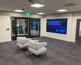 DVLED wall mounted in a recess in a business reception