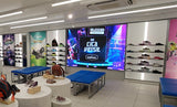 DVLED wall mounted in a Clarkes retail shoe shop