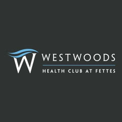 Westwoods Health Club at Fettes logo on a black background
